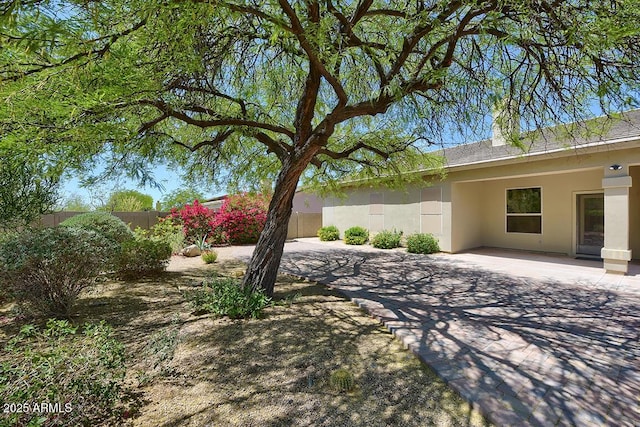 view of yard with a patio and a fenced backyard