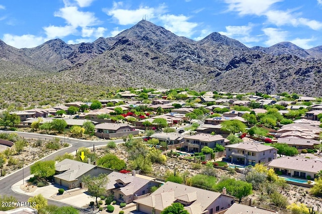 aerial view with a residential view and a mountain view