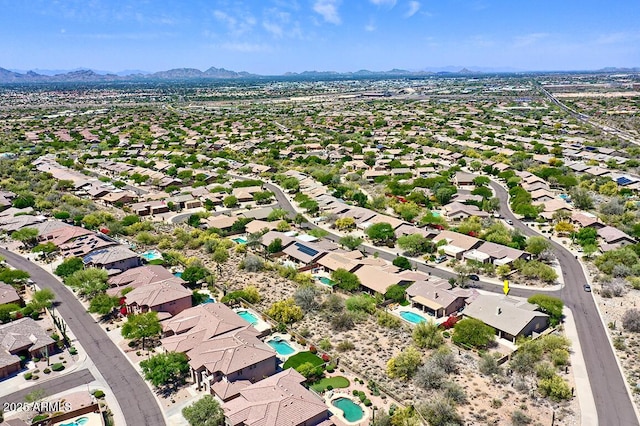 birds eye view of property featuring a residential view and a mountain view