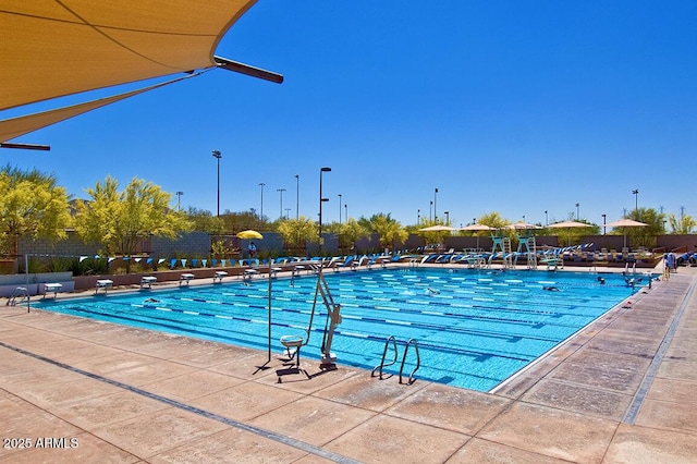 pool featuring fence