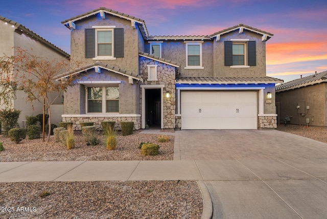 view of front of home with a garage