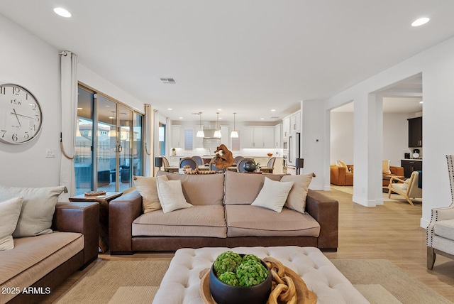 living room with light wood-type flooring