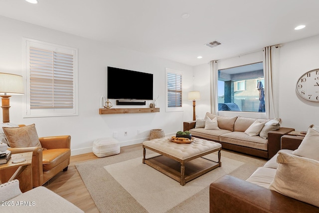 living room featuring light wood-type flooring