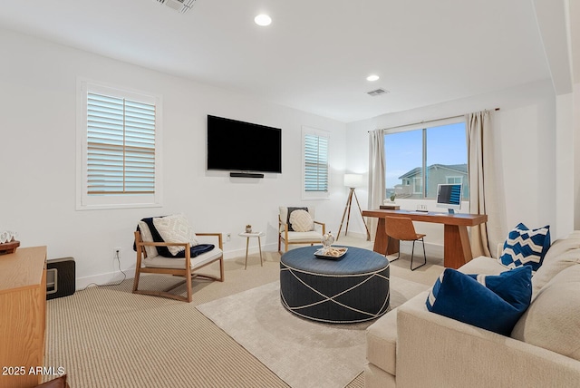 living room featuring light colored carpet