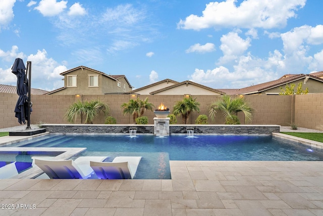 view of swimming pool with pool water feature