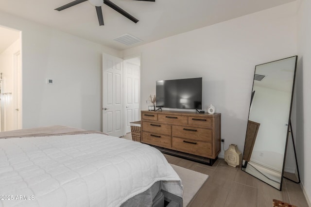 17973 W Ashley Dr, Goodyear, AZ 85338 - bedroom featuring light wood finished floors and ceiling fan
