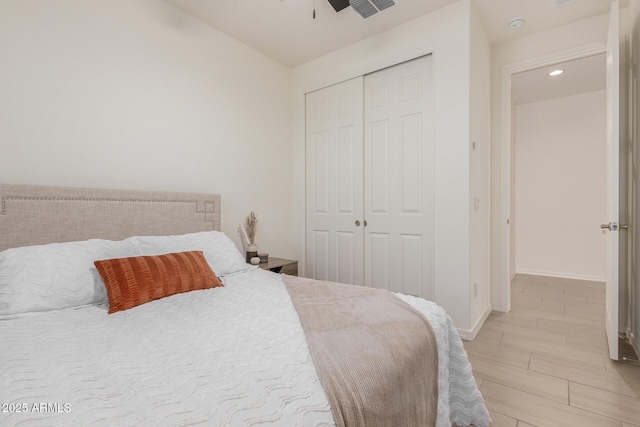 17973 W Ashley Dr, Goodyear, AZ 85338 - bedroom with a closet, baseboards, recessed lighting, and light wood-style flooring
