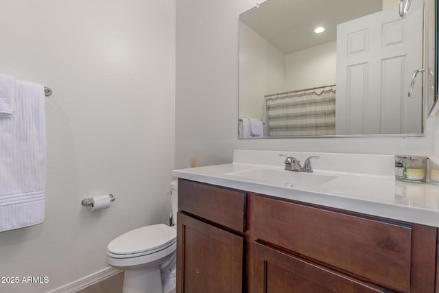 17973 W Ashley Dr, Goodyear, AZ 85338 - bathroom featuring vanity, toilet, and baseboards