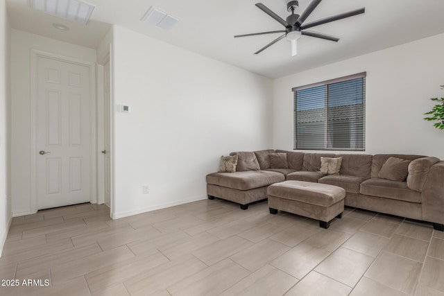 17973 W Ashley Dr, Goodyear, AZ 85338 - living area with a ceiling fan and baseboards