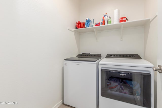 17973 W Ashley Dr, Goodyear, AZ 85338 - laundry room with washing machine and dryer and baseboards