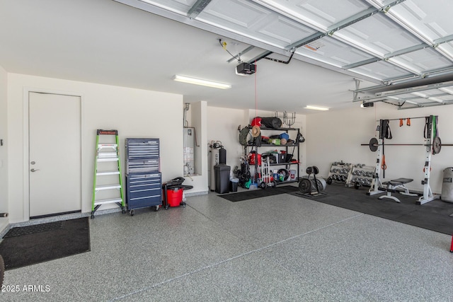 17973 W Ashley Dr, Goodyear, AZ 85338 - garage with a garage door opener and gas water heater