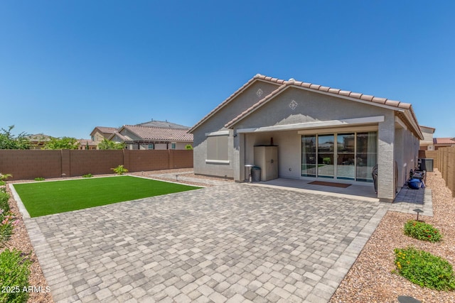 17973 W Ashley Dr, Goodyear, AZ 85338 - back of house with a patio, stucco siding, and a tile roof