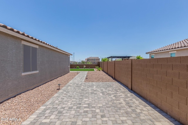 17973 W Ashley Dr, Goodyear, AZ 85338 - fenced backyard with a patio