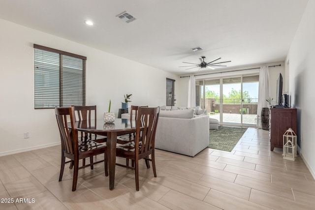 17973 W Ashley Dr, Goodyear, AZ 85338 - dining area featuring a ceiling fan, baseboards, and recessed lighting