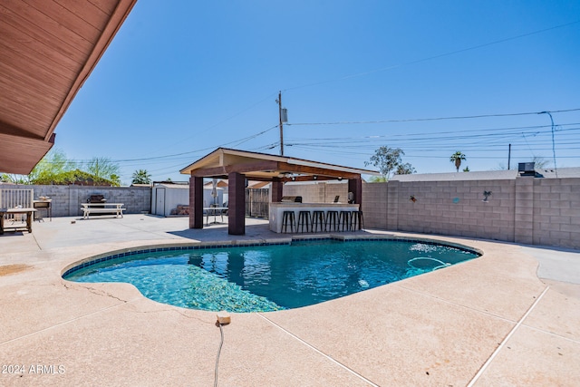 view of swimming pool featuring a patio area and a gazebo