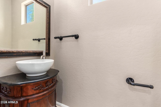 8795 W Windsor Dr, Peoria, AZ 85381 - bathroom featuring healthy amount of natural light and vanity
