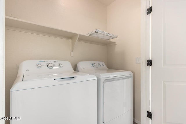 8795 W Windsor Dr, Peoria, AZ 85381 - clothes washing area featuring separate washer and dryer