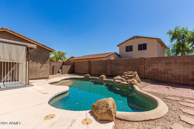 8795 W Windsor Dr, Peoria, AZ 85381 - view of swimming pool with a fenced backyard and a patio