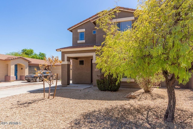 8795 W Windsor Dr, Peoria, AZ 85381 - view of front facade featuring stucco siding and driveway