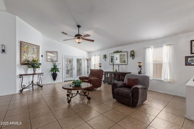 10465 W Windsor Blvd, Glendale, AZ 85307 - living room featuring lofted ceiling, a ceiling fan, light tile patterned floors, and baseboards