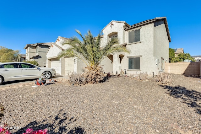 view of front of property featuring a garage