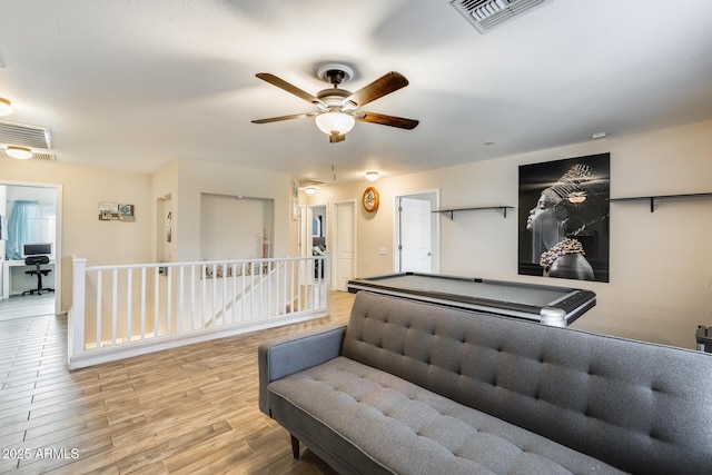 interior space featuring light hardwood / wood-style flooring and ceiling fan