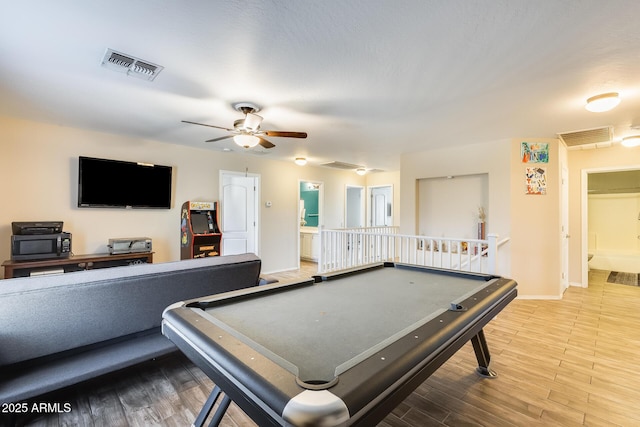 playroom featuring pool table, wood-type flooring, and ceiling fan