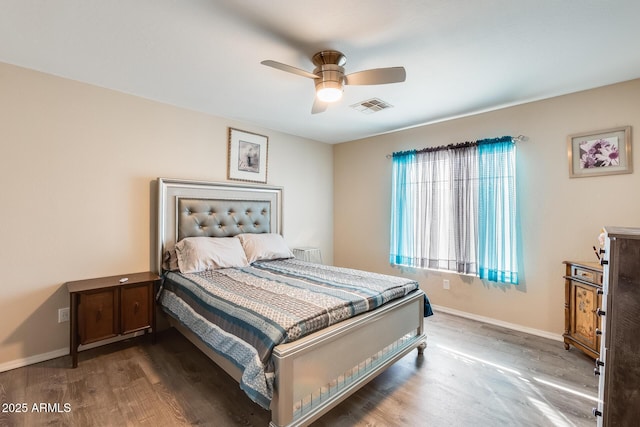 bedroom featuring hardwood / wood-style flooring and ceiling fan