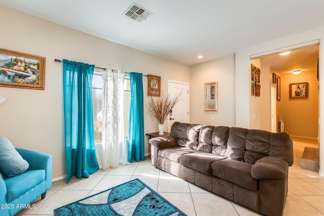 living room with light tile patterned floors