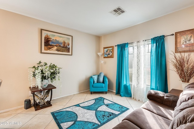 sitting room featuring light tile patterned floors