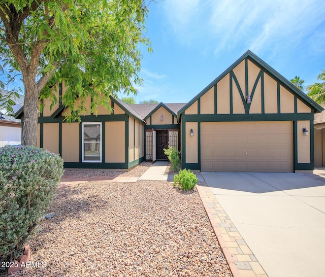 20609 N 4th Ave, Phoenix, AZ 85027 - tudor-style house with stucco siding, a garage, and concrete driveway