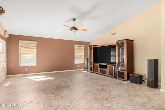 unfurnished living room with light tile patterned flooring, visible vents, ceiling fan, and baseboards