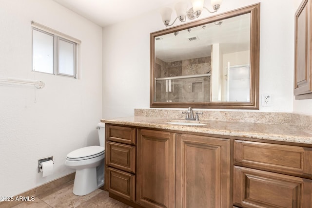 bathroom featuring tile patterned flooring, toilet, visible vents, vanity, and a stall shower