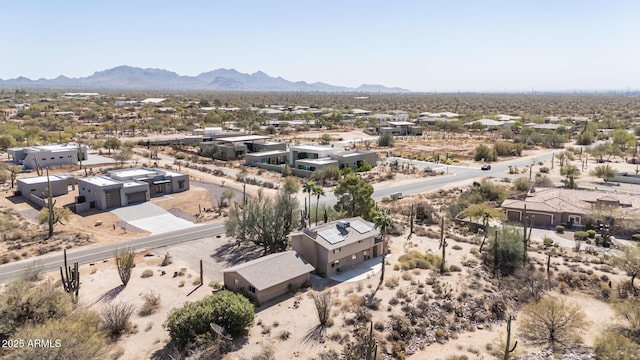 drone / aerial view with a mountain view and a desert view