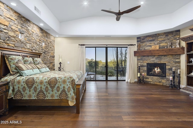 36389 N 105th Pl, Scottsdale, AZ 85262 - bedroom featuring access to exterior, lofted ceiling, hardwood / wood-style floors, recessed lighting, and a fireplace