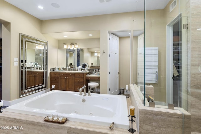 36389 N 105th Pl, Scottsdale, AZ 85262 - full bathroom with a tub with jets, vanity, and recessed lighting