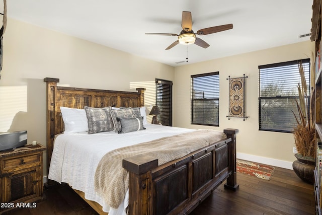 36389 N 105th Pl, Scottsdale, AZ 85262 - bedroom featuring dark wood-type flooring, baseboards, and a ceiling fan