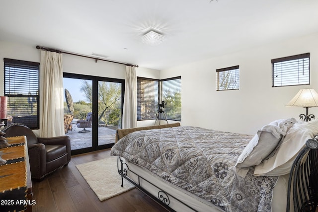 36389 N 105th Pl, Scottsdale, AZ 85262 - bedroom with access to outside, multiple windows, and dark wood-style floors