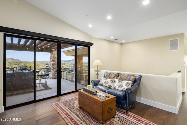 36389 N 105th Pl, Scottsdale, AZ 85262 - living area featuring hardwood / wood-style flooring, recessed lighting, vaulted ceiling, baseboards, and a mountain view