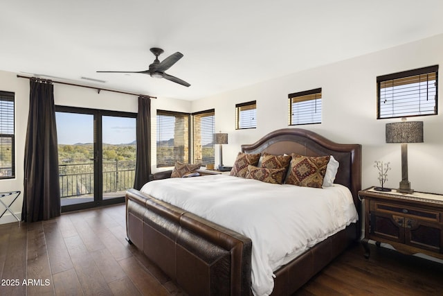 36389 N 105th Pl, Scottsdale, AZ 85262 - bedroom with access to outside, dark wood-style floors, and a ceiling fan