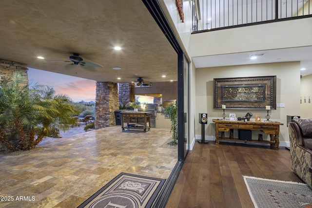36389 N 105th Pl, Scottsdale, AZ 85262 - living area with a ceiling fan, decorative columns, hardwood / wood-style floors, and recessed lighting