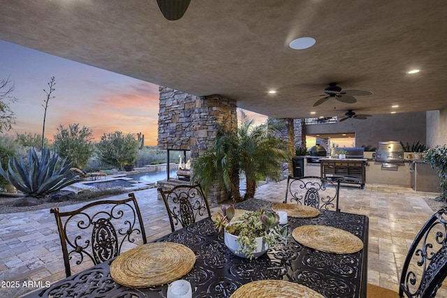 36389 N 105th Pl, Scottsdale, AZ 85262 - patio terrace at dusk featuring a patio and a ceiling fan
