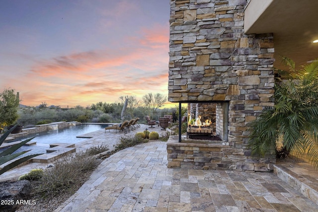 36389 N 105th Pl, Scottsdale, AZ 85262 - view of patio featuring an outdoor stone fireplace
