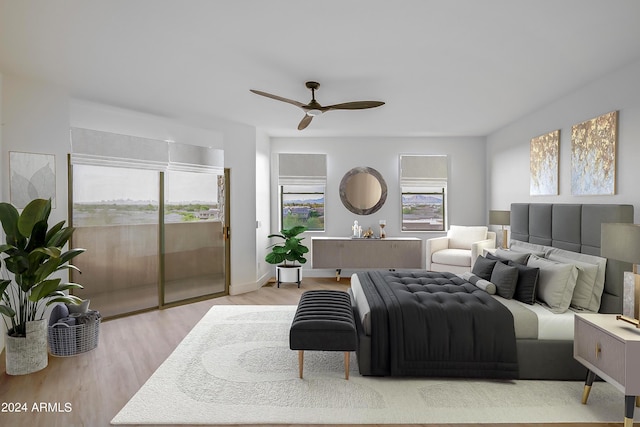 bedroom featuring ceiling fan, hardwood / wood-style flooring, and access to outside