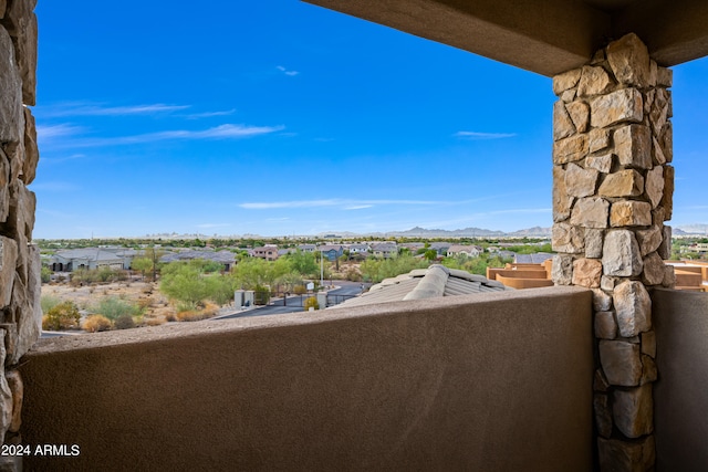 balcony featuring a mountain view