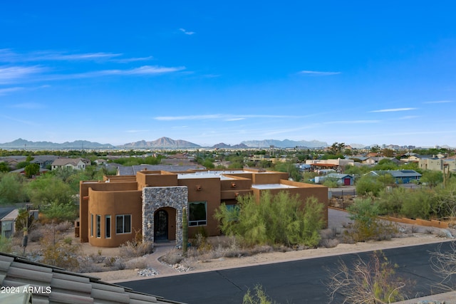 exterior space featuring a mountain view