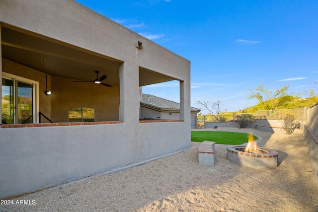 view of patio featuring a fire pit