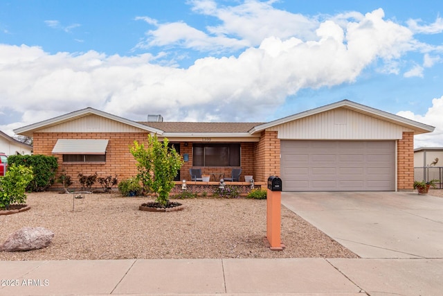 ranch-style home featuring brick siding, an attached garage, a porch, and driveway