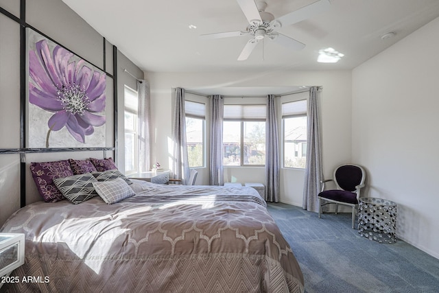 bedroom featuring ceiling fan and carpet flooring