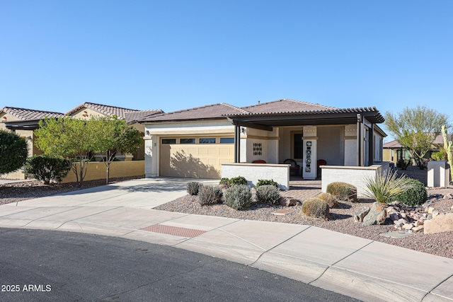 view of front of property with a garage